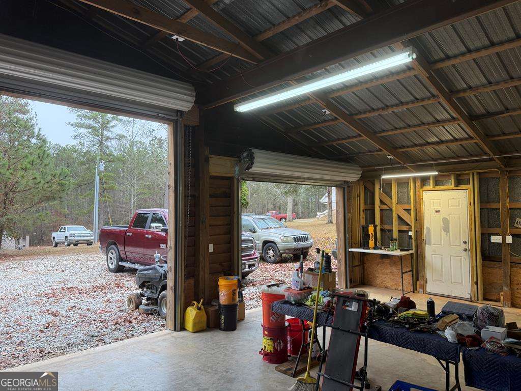 1837 Whooping Creek Road Carrollton, GA 30116 - Photo 14 of 19 a view of a room with gym equipment