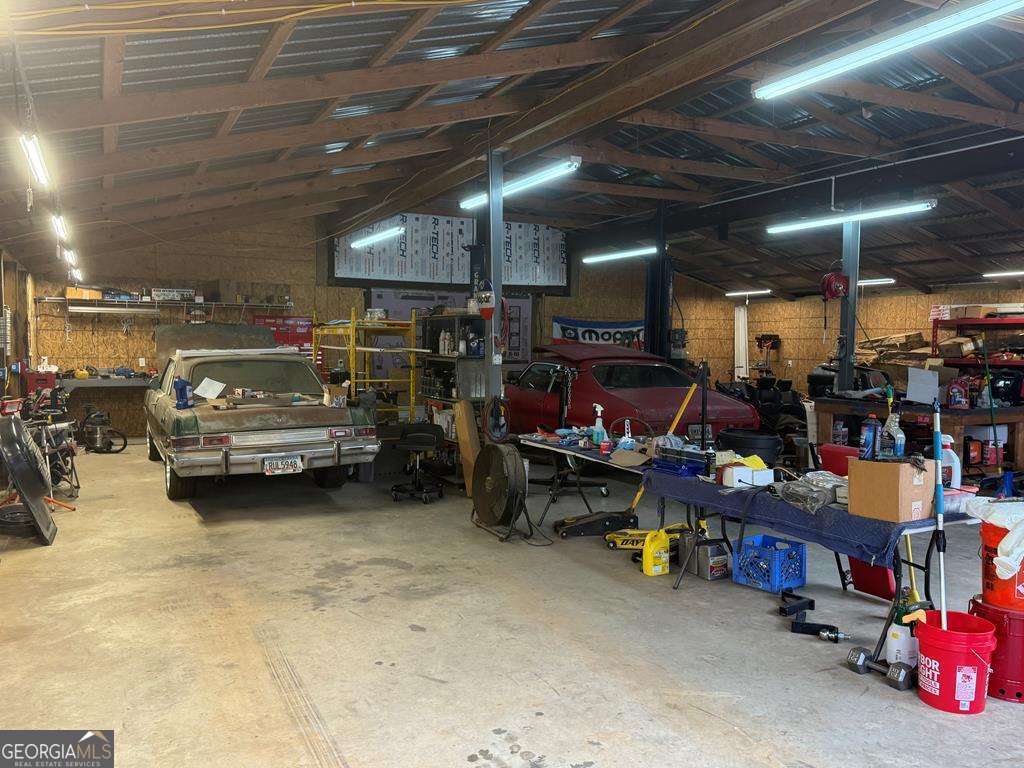 1837 Whooping Creek Road Carrollton, GA 30116 - Photo 16 of 19 a view of a garage with storage
