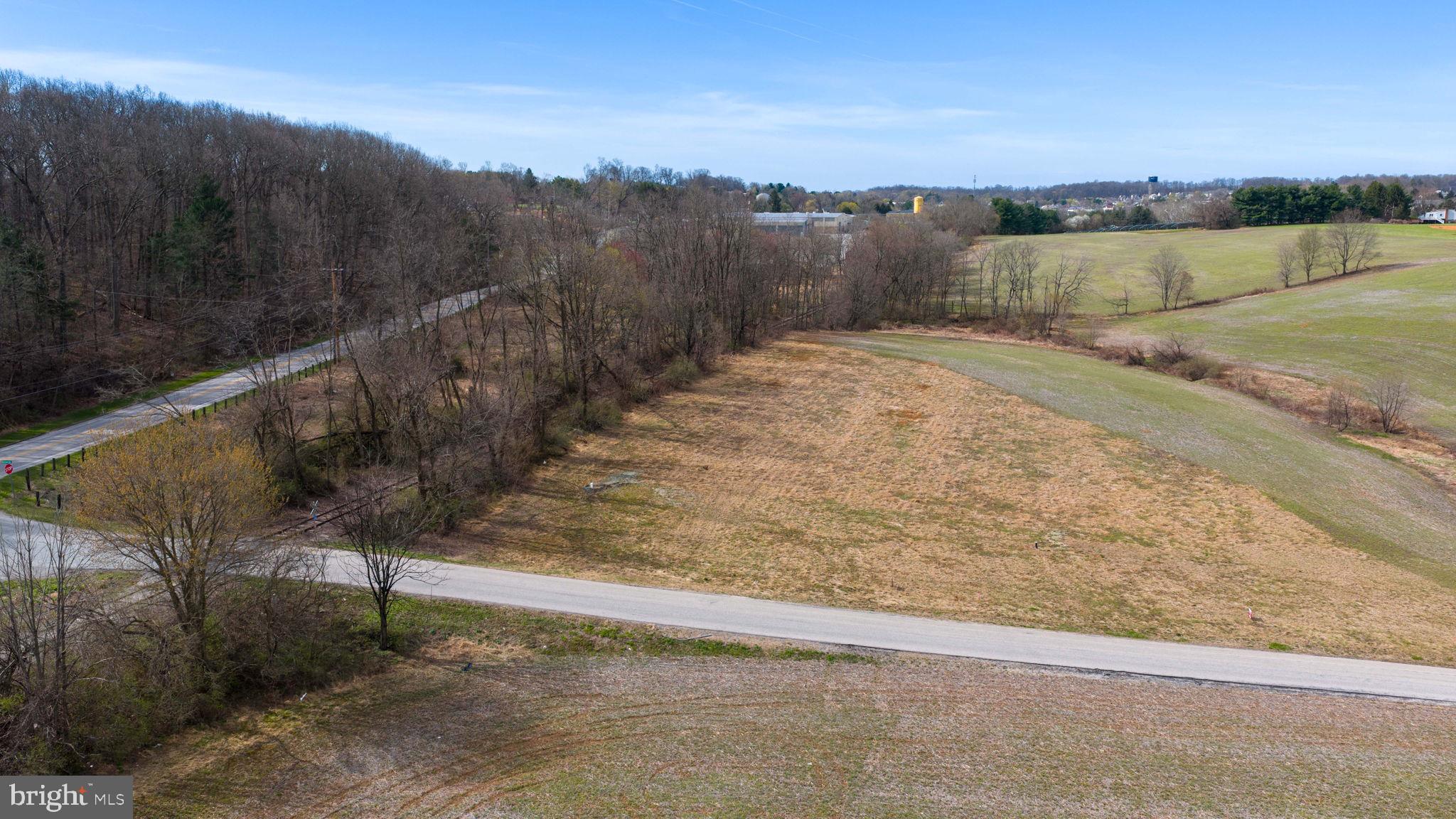 901 Kirchner Road New Freedom, PA 17349 - Photo 11 of 18 a view of a yard with a wooden fence