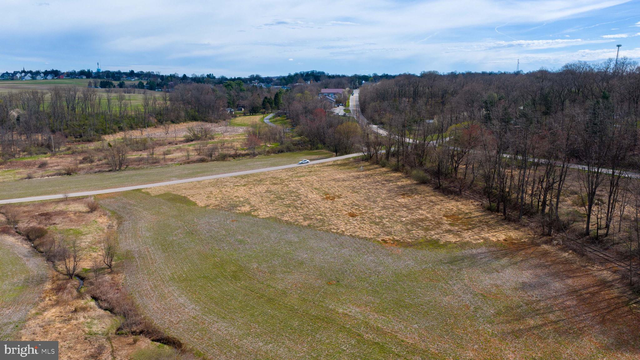 901 Kirchner Road New Freedom, PA 17349 - Photo 12 of 18 a view of a lake with a city