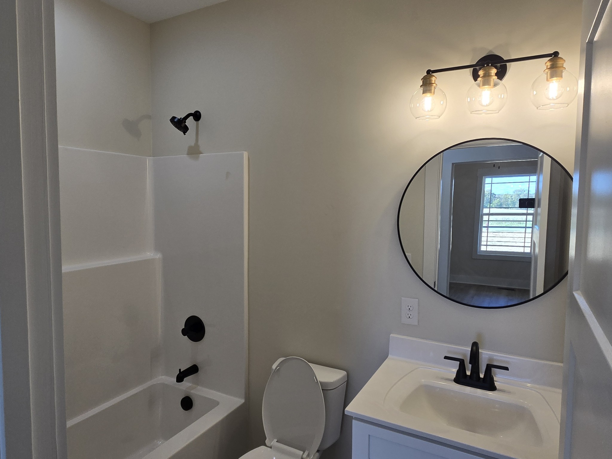 6006 Valley Road Springfield, TN 37172 - Photo 16 of 33 a bathroom with a sink toilet and shower