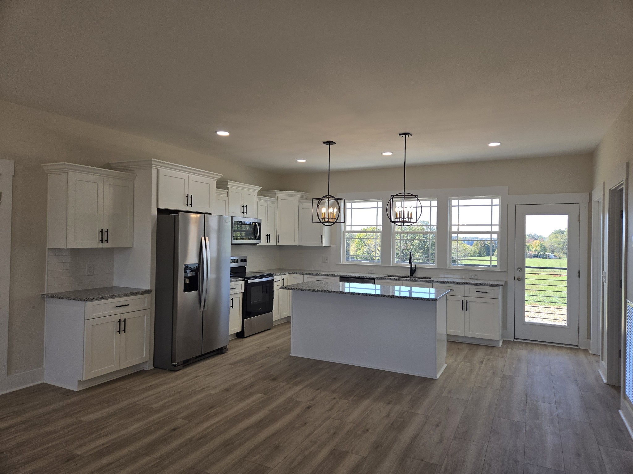 6006 Valley Road Springfield, TN 37172 - Photo 6 of 33 a kitchen with refrigerator and windows