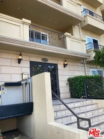 a utility room with a sink a washer and dryer