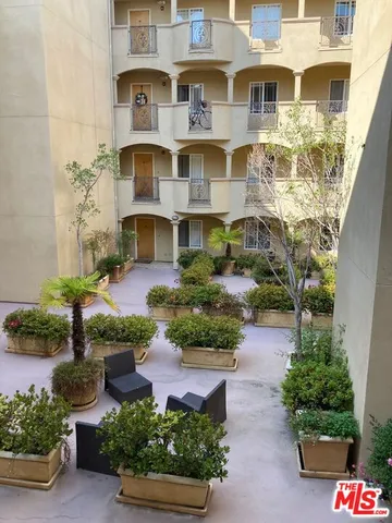 a front view of a multi story residential apartment building