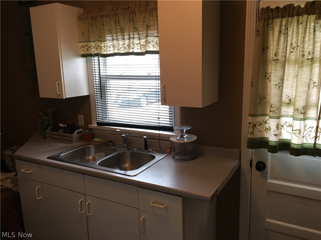 1207 Lake Road Conneaut, OH 44030 - Photo 23 of 33 Kitchen number two on first floor, great for easy access for refreshments by the pool.