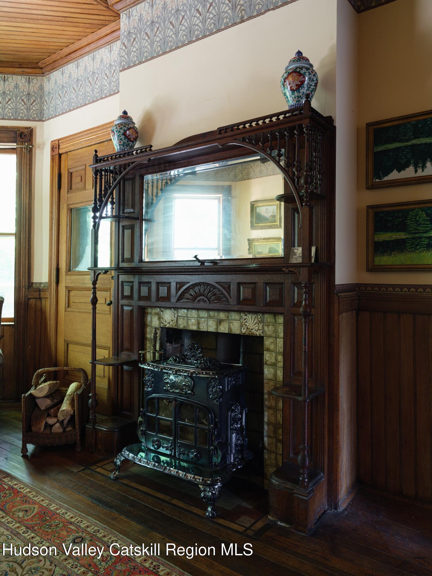 2659 County Rte 9 East Chatham, NY 12060 - Photo 13 of 46 a living room with furniture and a fireplace
