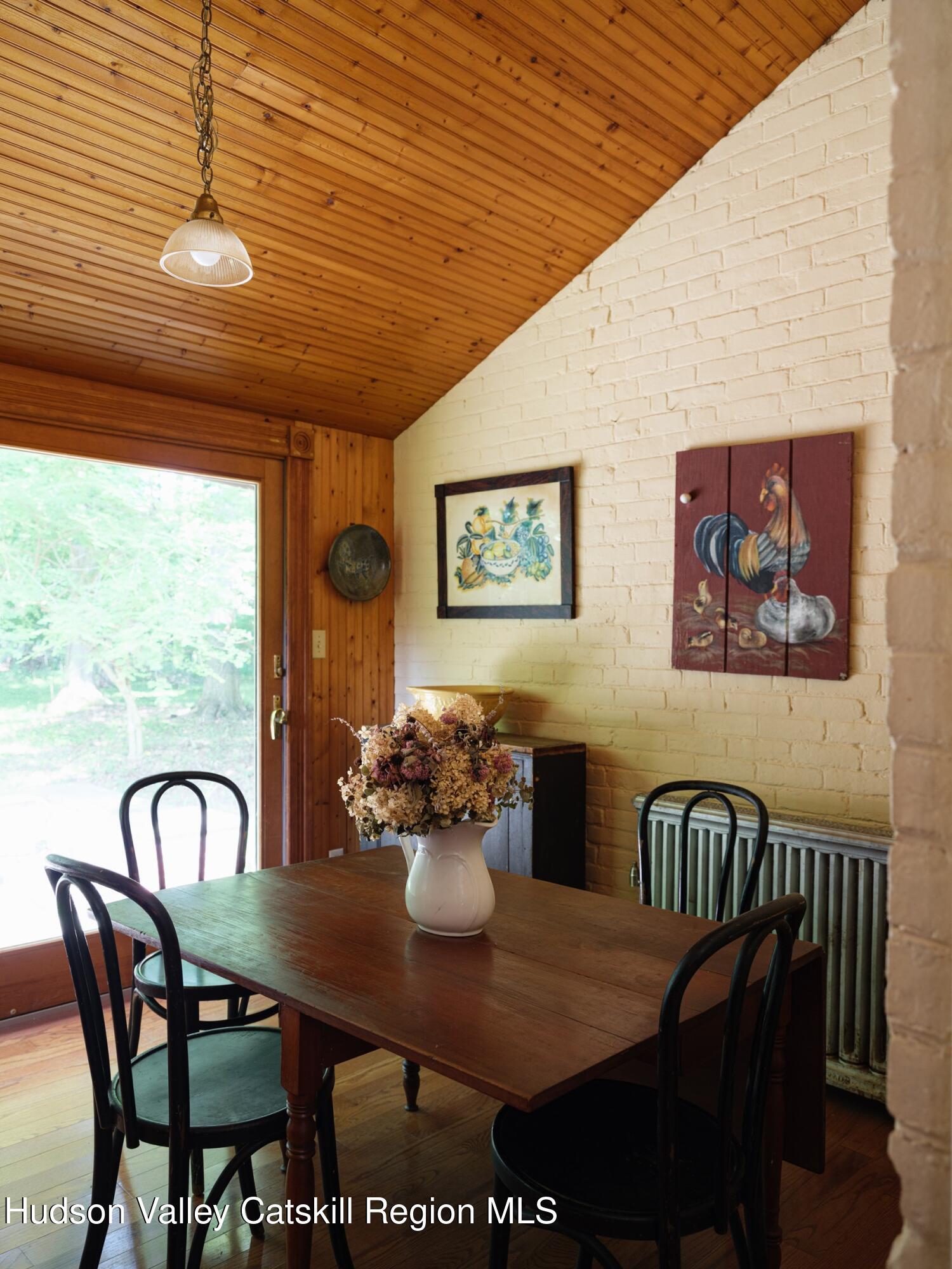 2659 County Rte 9 East Chatham, NY 12060 - Photo 14 of 46 a view of a dining room with furniture window and outdoor view