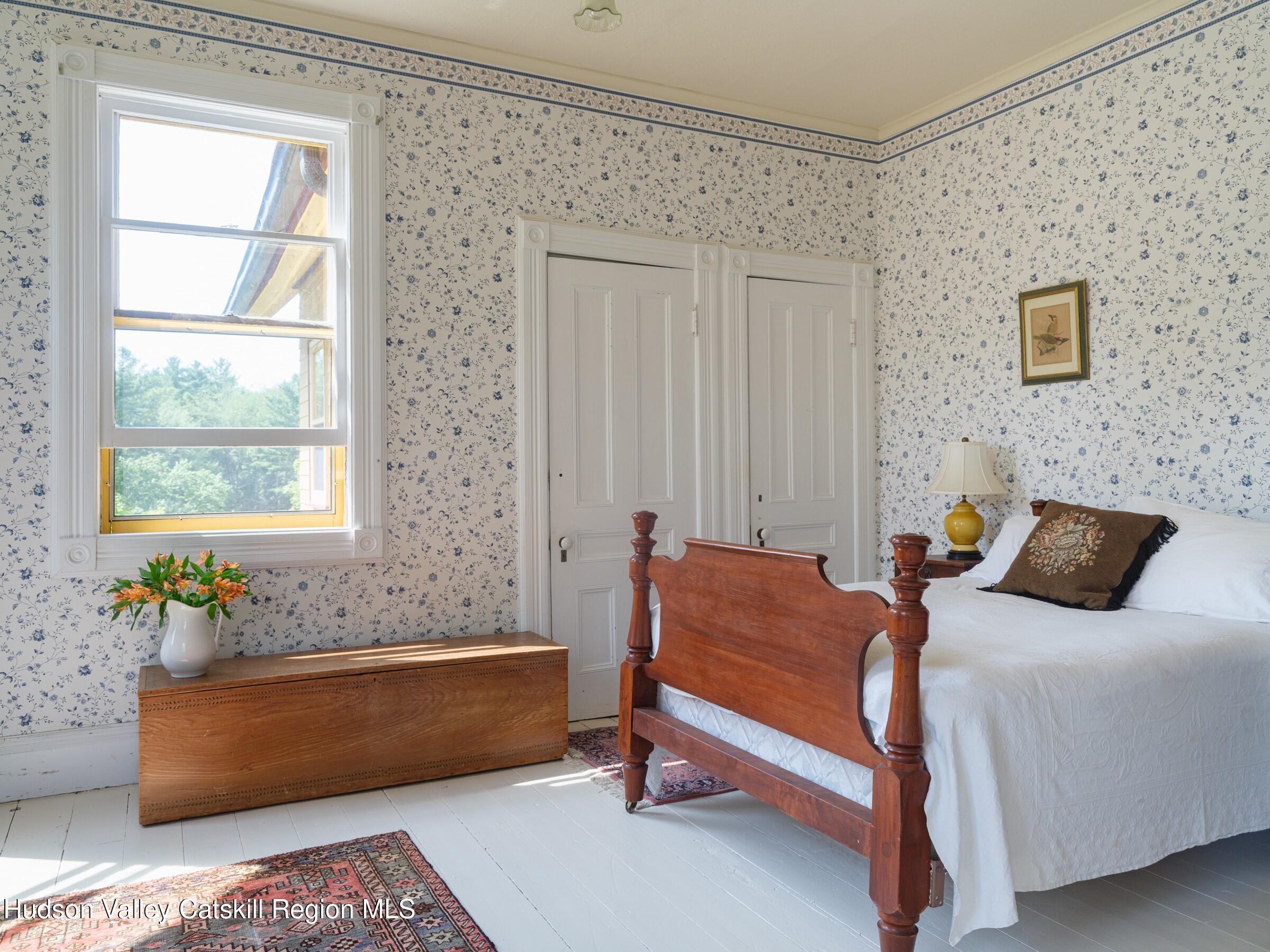 2659 County Rte 9 East Chatham, NY 12060 - Photo 21 of 46 a bedroom with furniture and a window