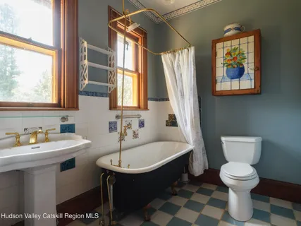 a bathroom with a sink and a toilet