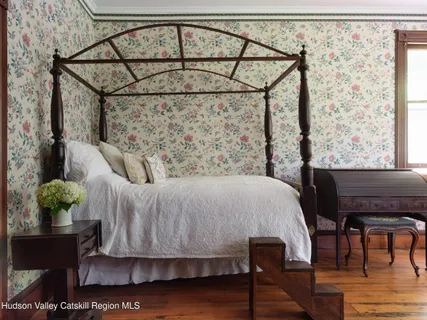 a living room with a couch and a table