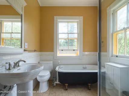 a bathroom with a sink and a bathtub