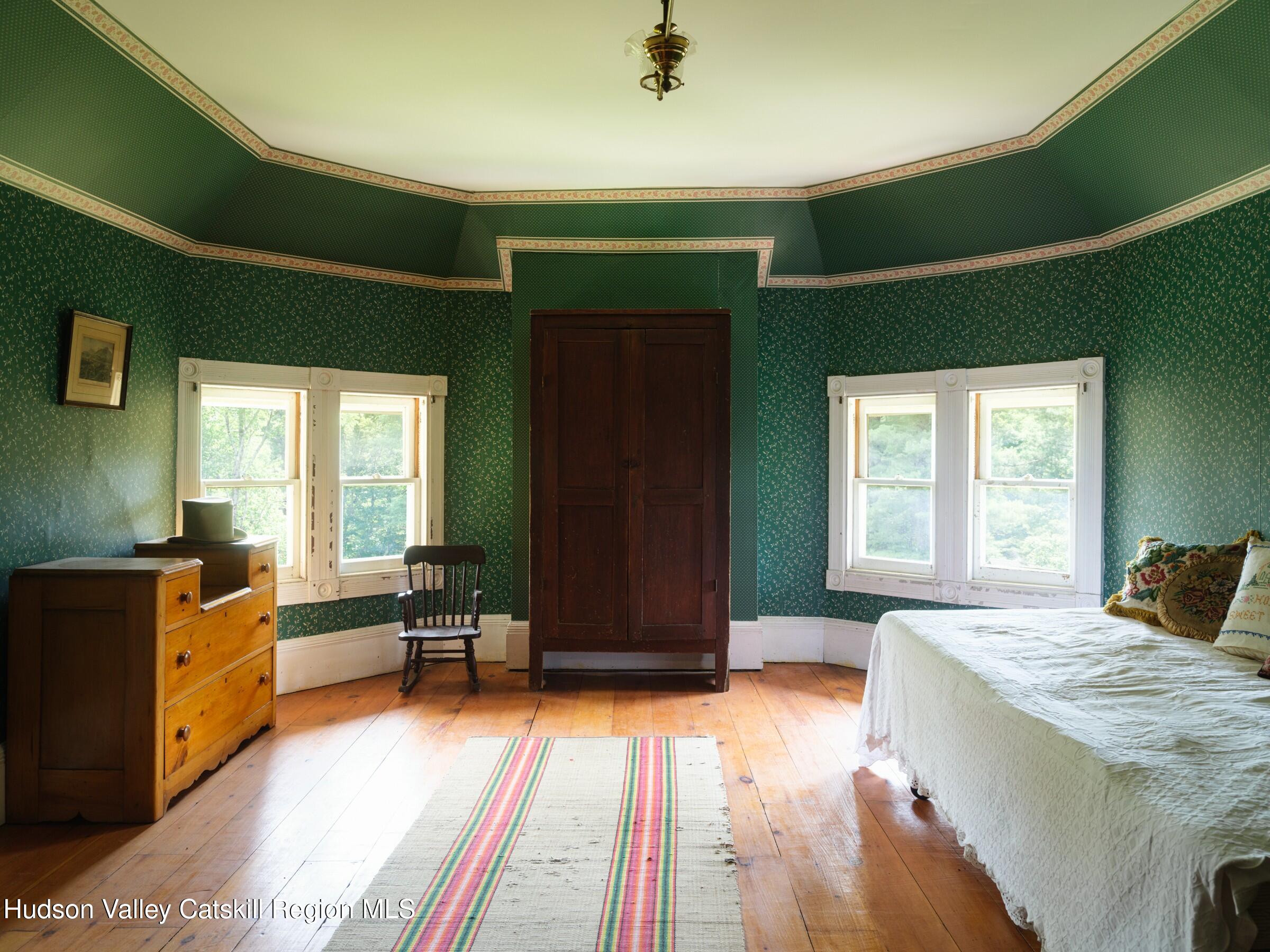 2659 County Rte 9 East Chatham, NY 12060 - Photo 31 of 46 a living room with furniture and large windows