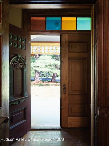 a view of a living room with a large window