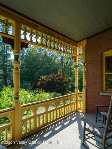 a view of a glass door with a balcony