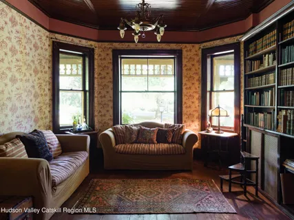 a living room with furniture or window and a couch