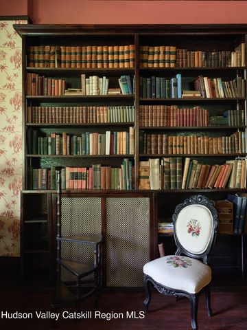 a view of a chairs and table in a room