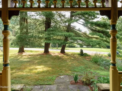 a view of a yard with a tree
