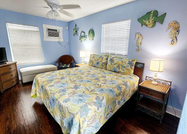 921 Center Street, Unit 12 Key West, FL 33040 - Photo 12 of 22 a bedroom with bed and a window