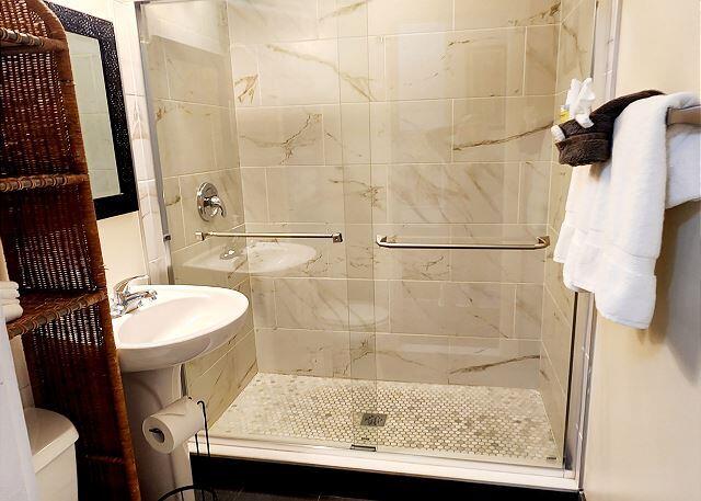 921 Center Street, Unit 12 Key West, FL 33040 - Photo 15 of 22 a bathroom with a sink toilet and shower