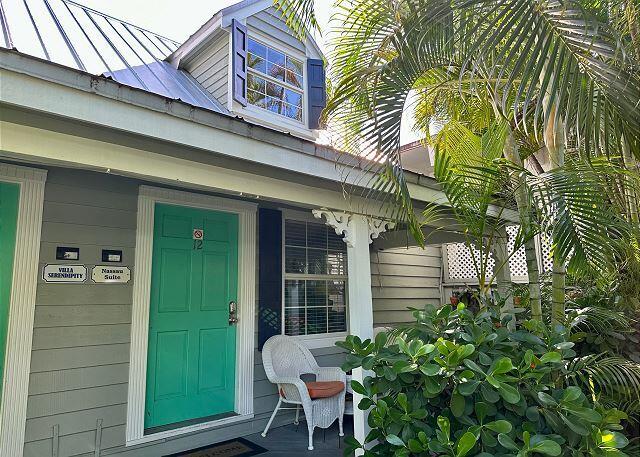 921 Center Street, Unit 12 Key West, FL 33040 - Photo 3 of 22 a front view of a building with entryway