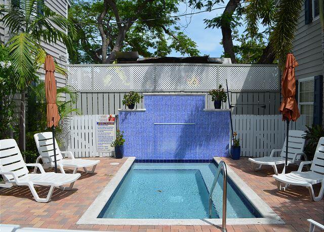 921 Center Street, Unit 12 Key West, FL 33040 - Photo 4 of 22 a view of a backyard with sitting area and furniture