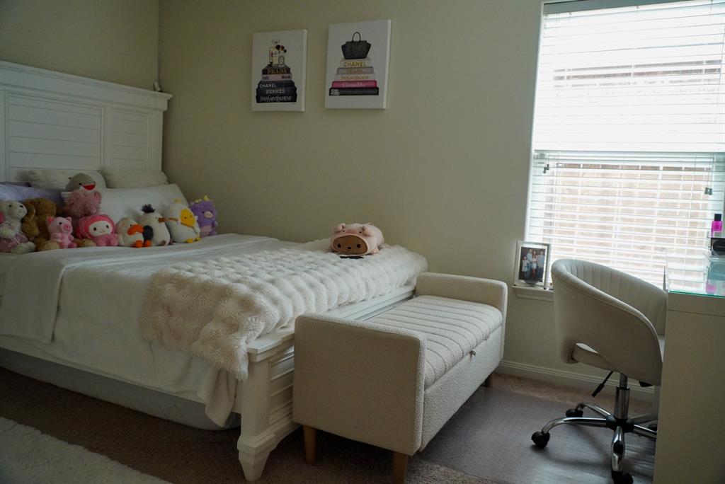 13624 Helix Bridge Way Crowley, TX 76036 - Photo 14 of 25 a bedroom with a bed and a window