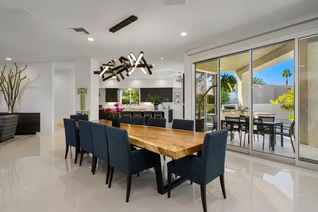 a view of swimming pool outdoor seating and yard