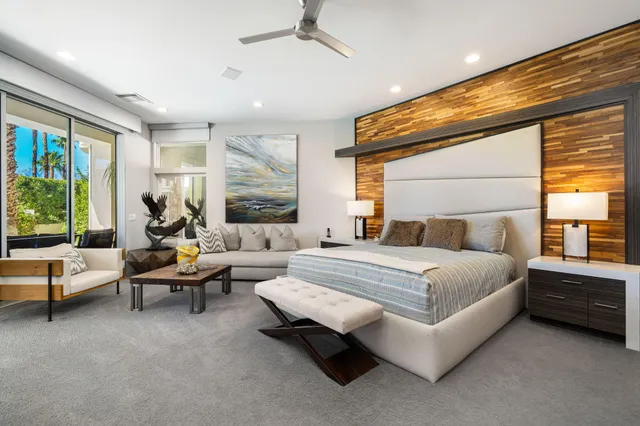 a kitchen with stainless steel appliances granite countertop a sink a stove and cabinets