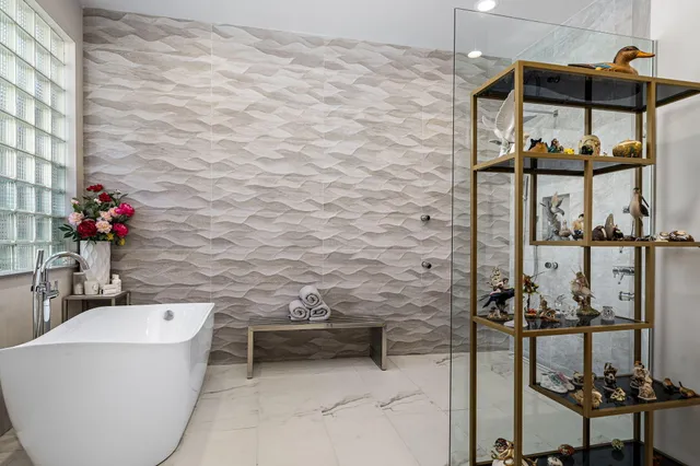 a bathroom with a shower and a toilet