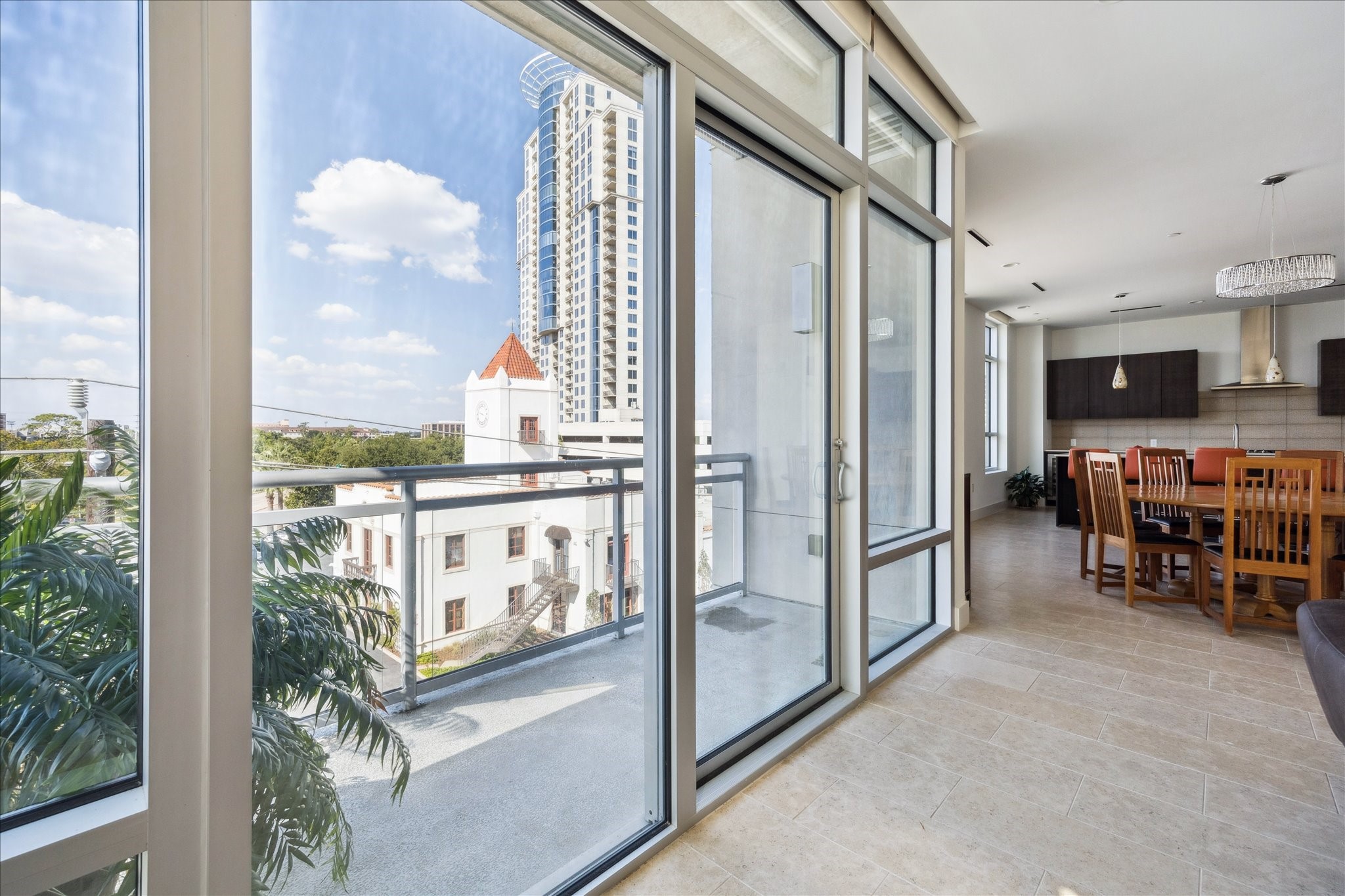 3331 D'Amico Street, Unit 404 Houston, TX 77019 - Photo 6 of 22 a very nice looking room with many windows and furniture