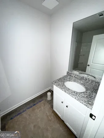 a view of empty room with windows