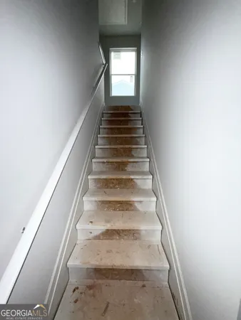 a bathroom with a sink and toilet