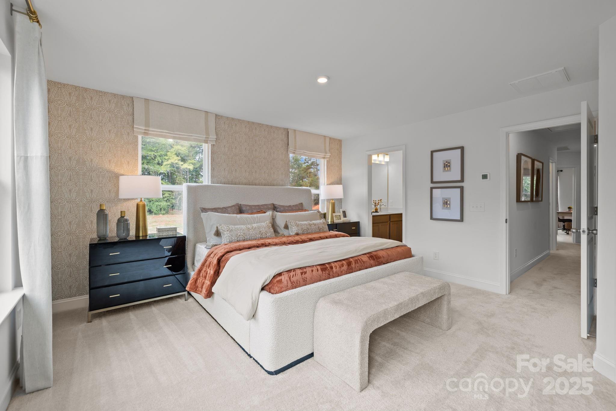 7708 Ethora Way Charlotte, NC 28216 - Photo 40 of 44 a bedroom with bed and window