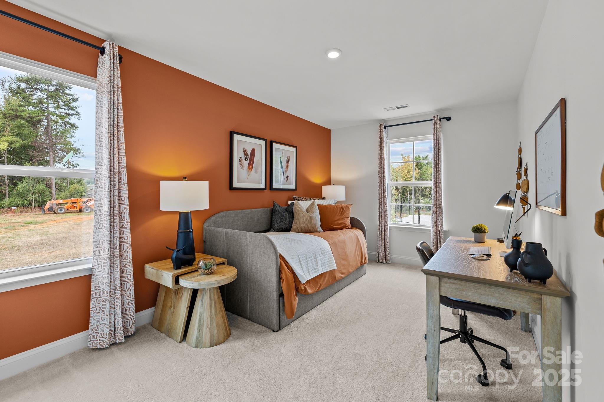 7708 Ethora Way Charlotte, NC 28216 - Photo 43 of 44 a bedroom with furniture and a window