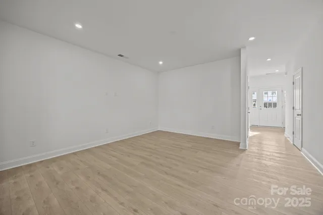 a kitchen with counter top space sink and refrigerator