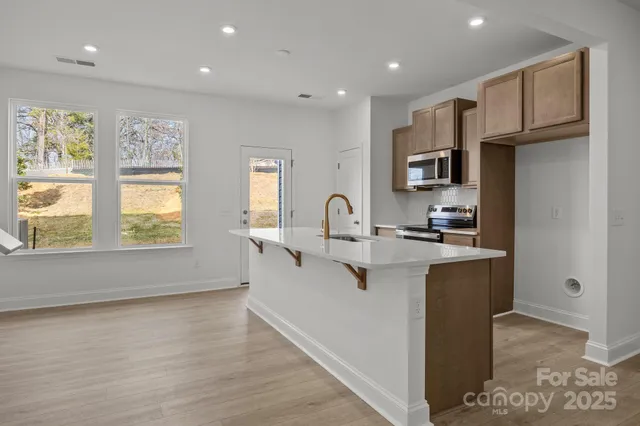 a bedroom with bed and window