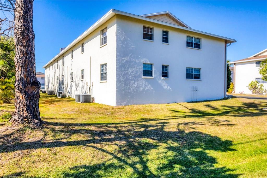 1531 Placida Road, Unit 202 Englewood, FL 34223 - Photo 43 of 44 a view of swimming pool with an outdoor space
