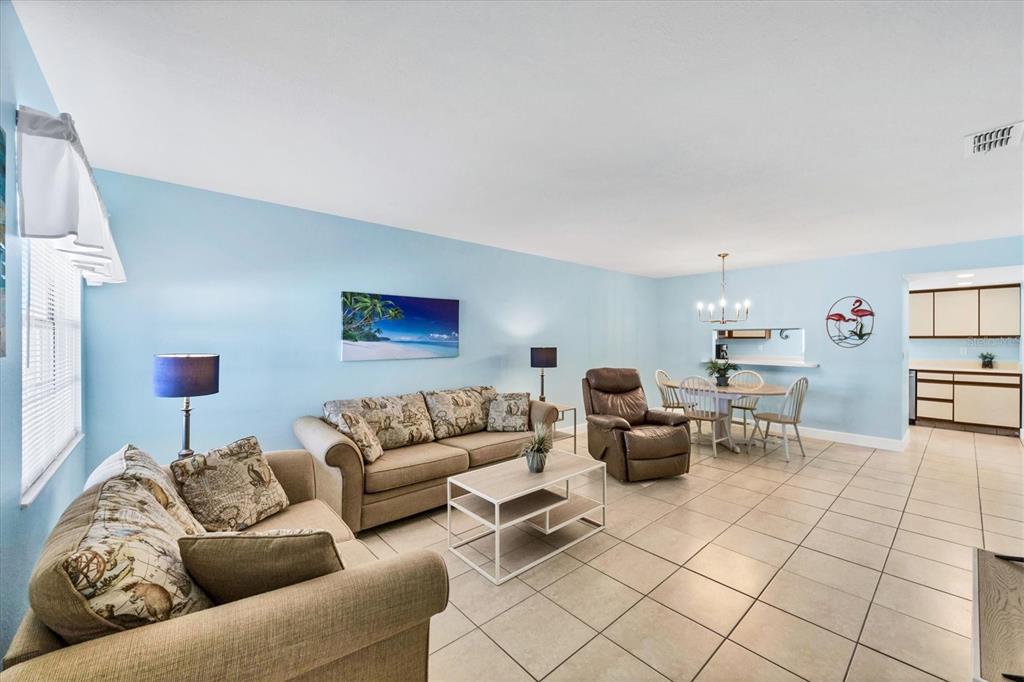 1531 Placida Road, Unit 202 Englewood, FL 34223 - Photo 8 of 44 a living room with furniture and a couch