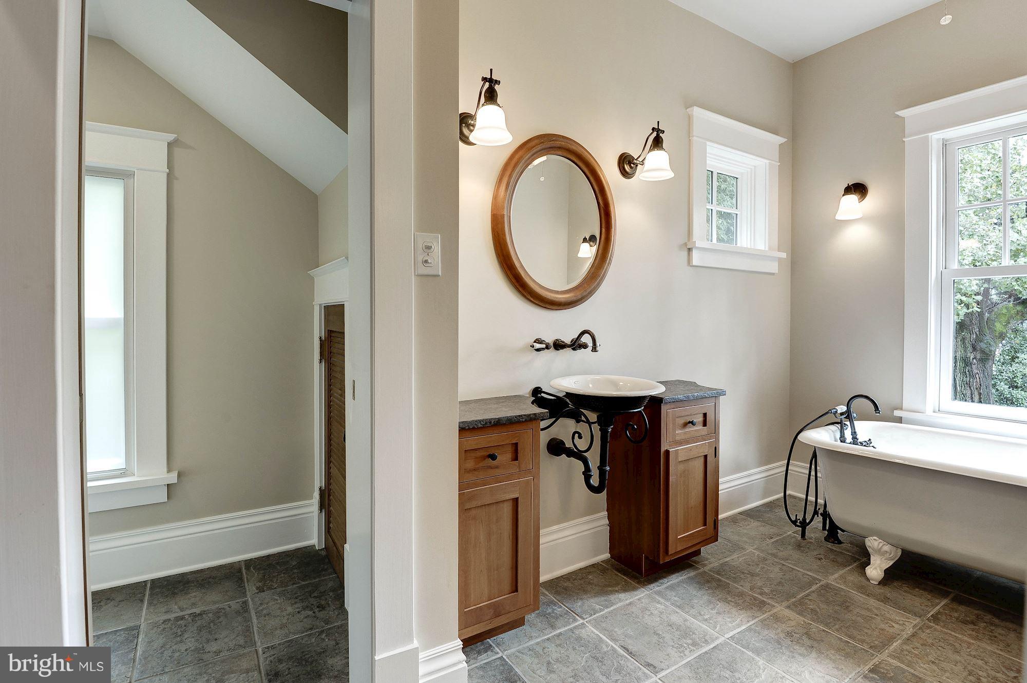 1213 Buchanan Street McLean, VA 22101 - Photo 17 of 30 a bathroom with a sink and a mirror
