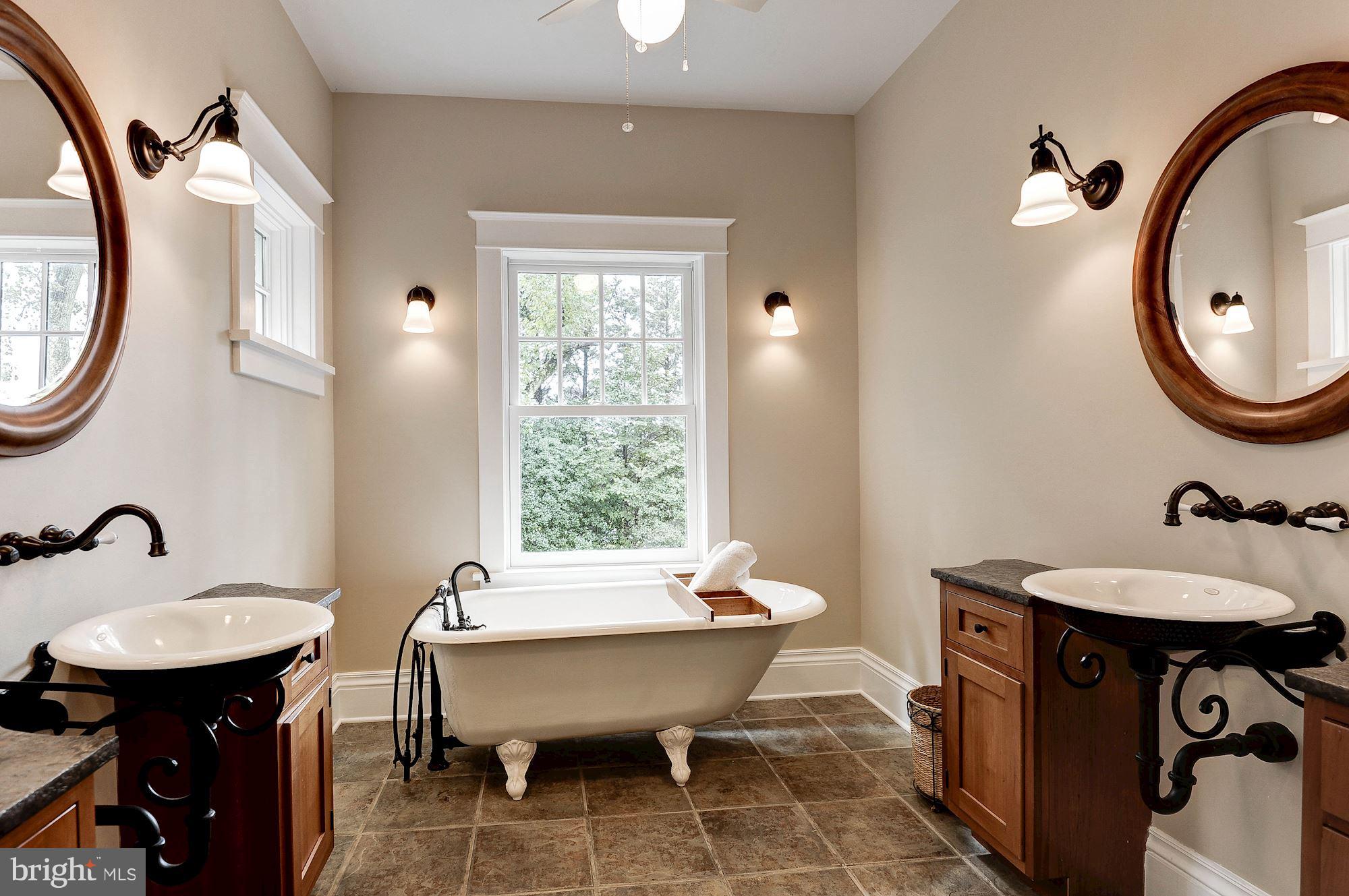 1213 Buchanan Street McLean, VA 22101 - Photo 19 of 30 a bathroom with a sink and a mirror