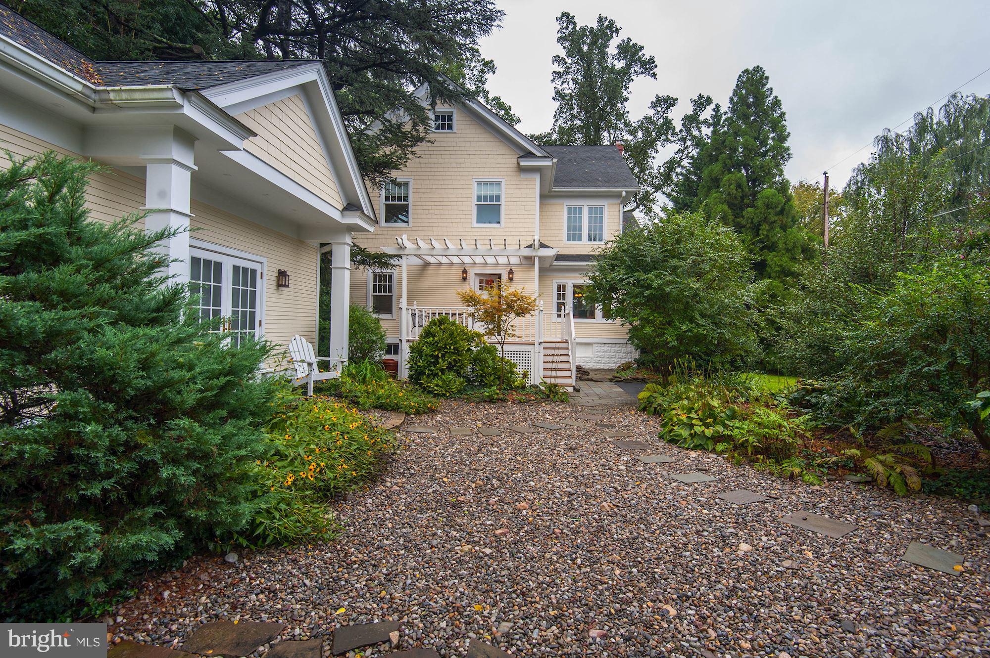 1213 Buchanan Street McLean, VA 22101 - Photo 25 of 30 a white house with trees in front of it