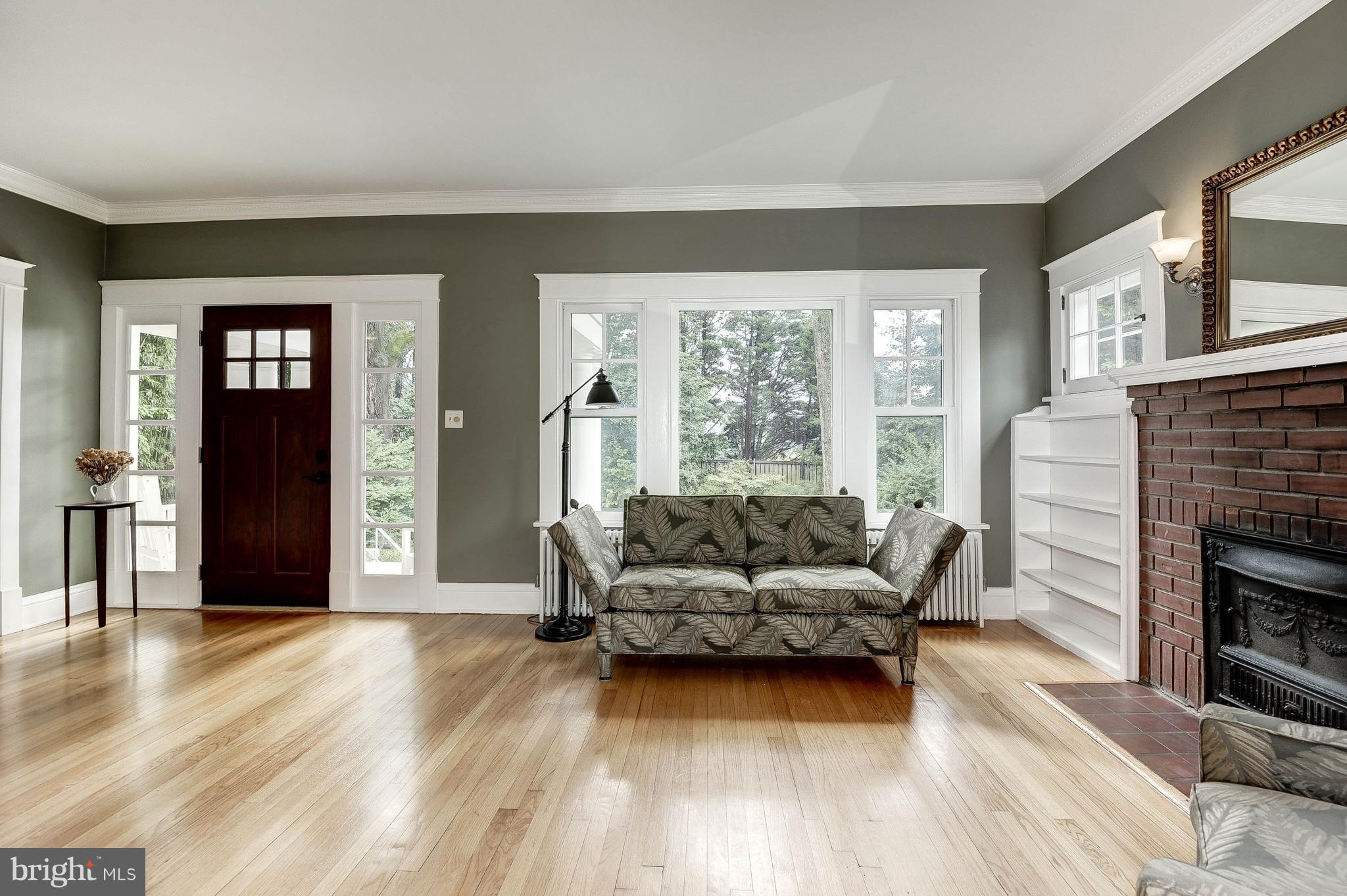 1213 Buchanan Street McLean, VA 22101 - Photo 4 of 30 a living room with furniture and a fireplace