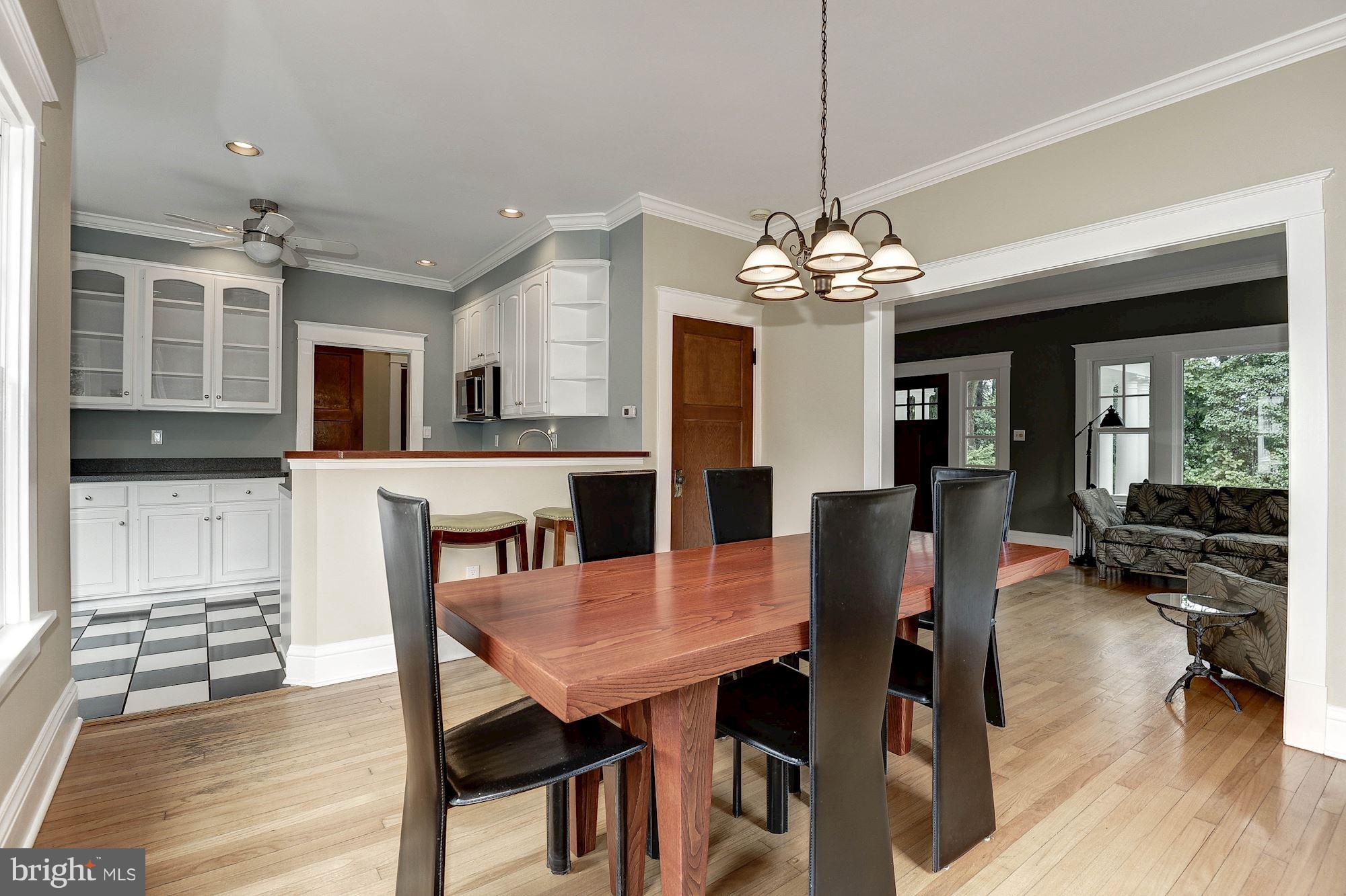1213 Buchanan Street McLean, VA 22101 - Photo 8 of 30 a view of a dining room with furniture window and wooden floor