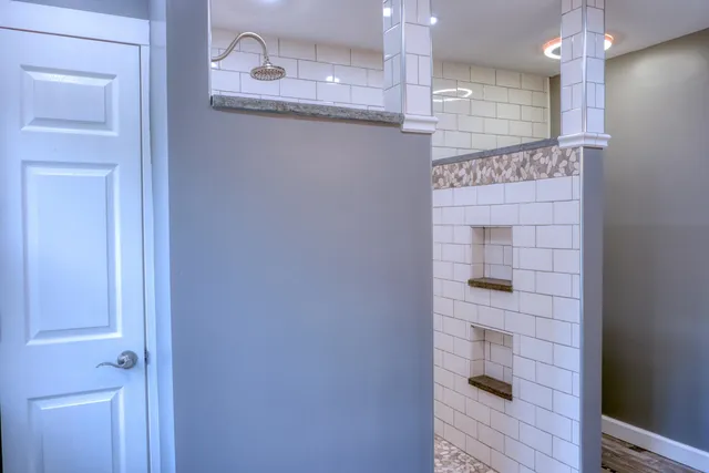 a view of a livingroom with furniture and a window
