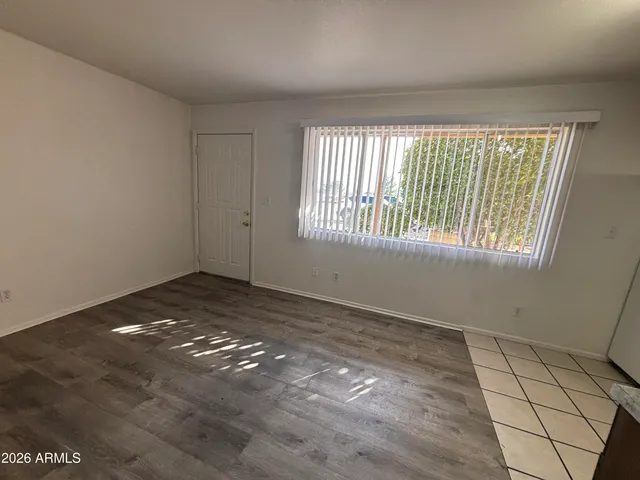 a view of an empty room and window