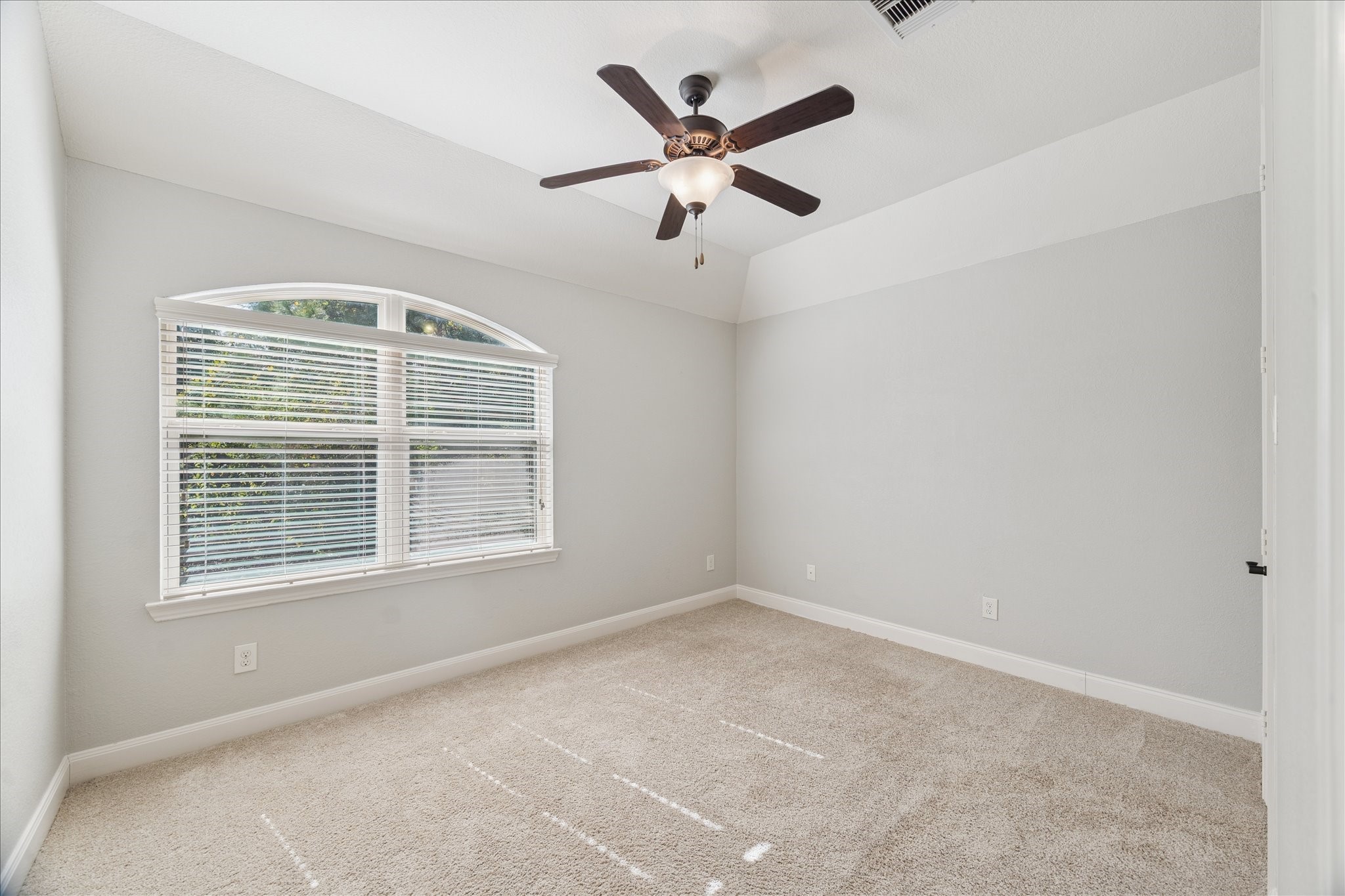 43 Herons Flight Place Spring, TX 77389 - Photo 8 of 10 a view of an empty room with a window