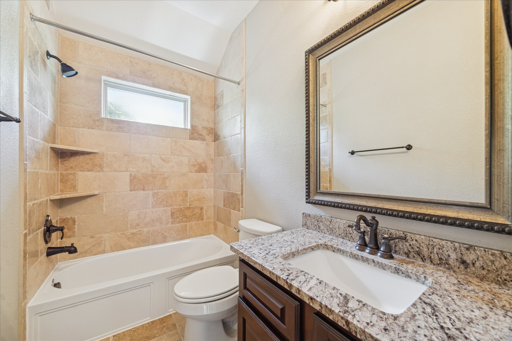 43 Herons Flight Place Spring, TX 77389 - Photo 10 of 10 a bathroom with a granite countertop sink toilet and shower