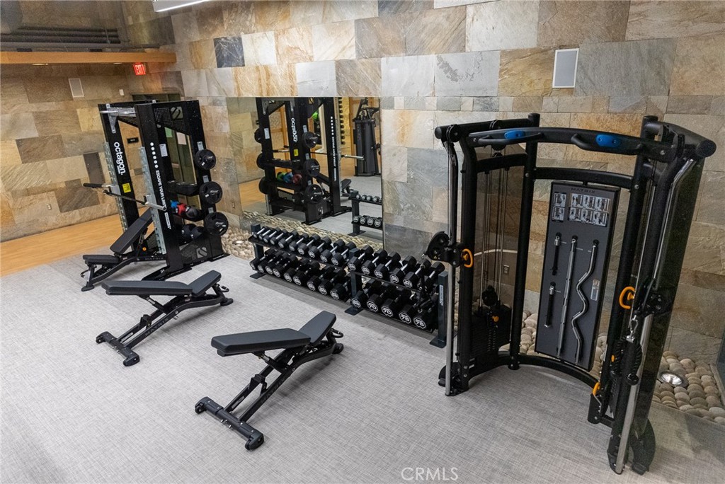 21 Gramercy, Unit 102 Irvine, CA 92612 - Photo 26 of 30 Fully equipped fitness center offering convenient onsite wellness and workout options.
