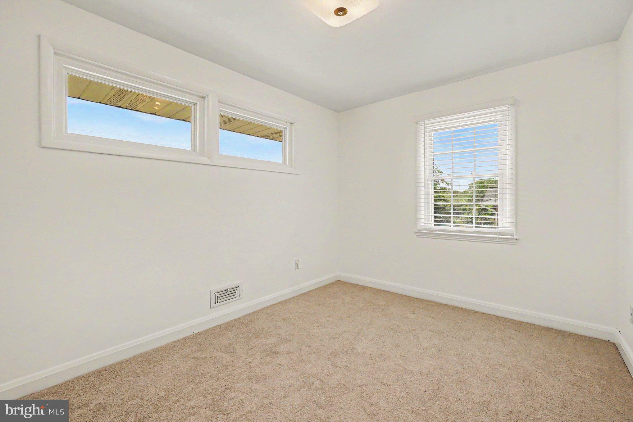 9204 Snyder Lane Perry Hall, MD 21128 - Photo 14 of 42 an empty room with windows