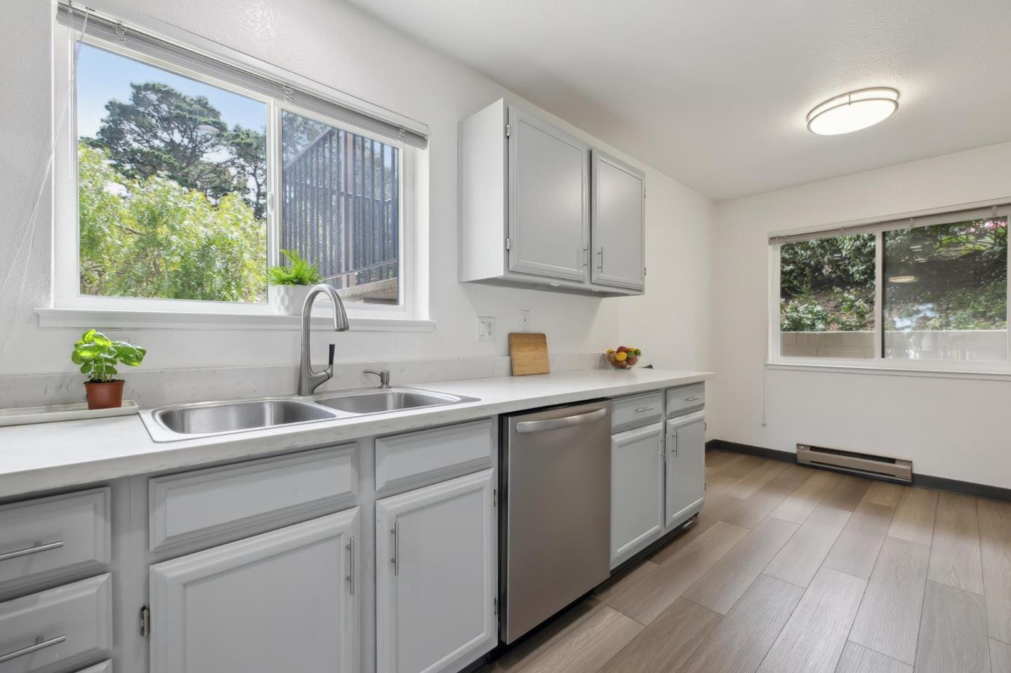 46 Shepherds Knoll Road Pebble Beach, CA 93953 - Photo 15 of 41 a kitchen with a sink cabinets and window